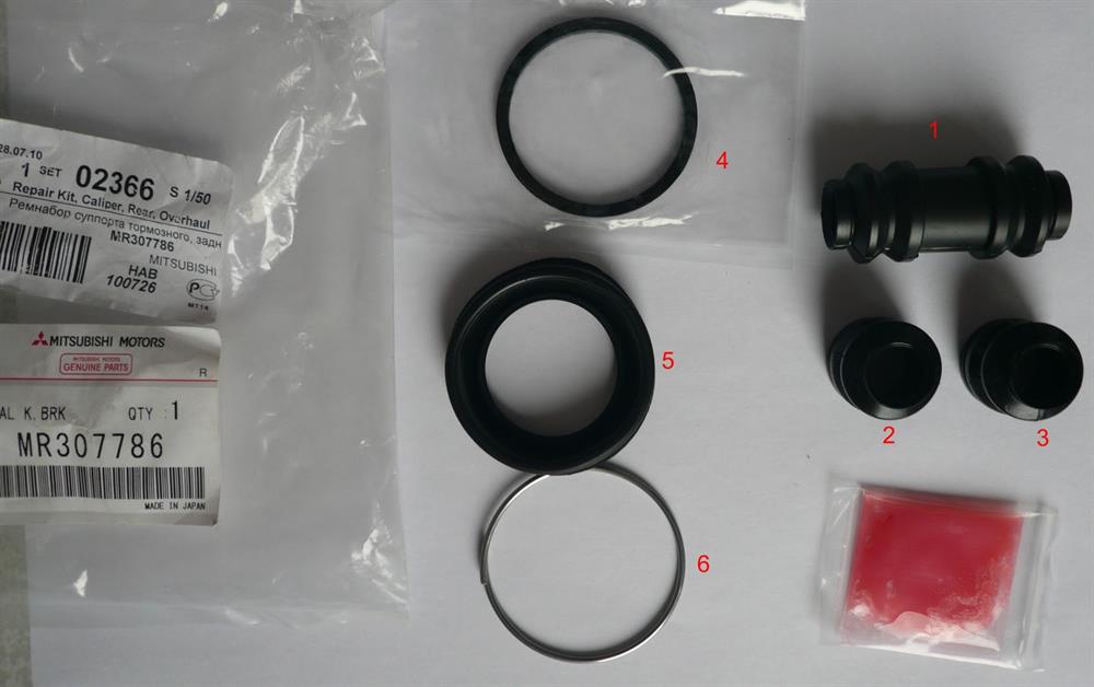 MR307786 Mitsubishi Kit de reparação de suporte do freio traseiro