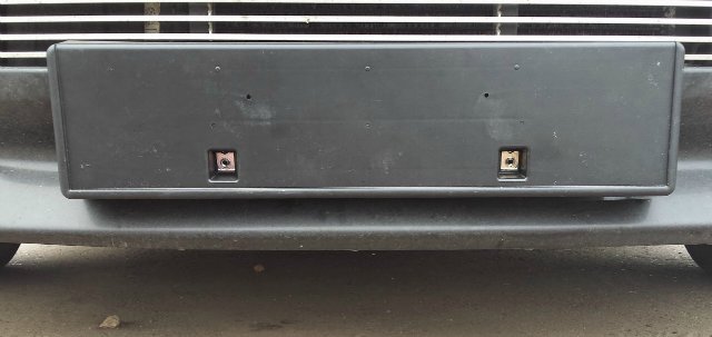 MN181218 Mitsubishi Painel de fixação de matrícula dianteira