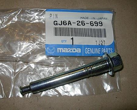 GJ6A26699 Mazda Guia superior de suporte traseiro