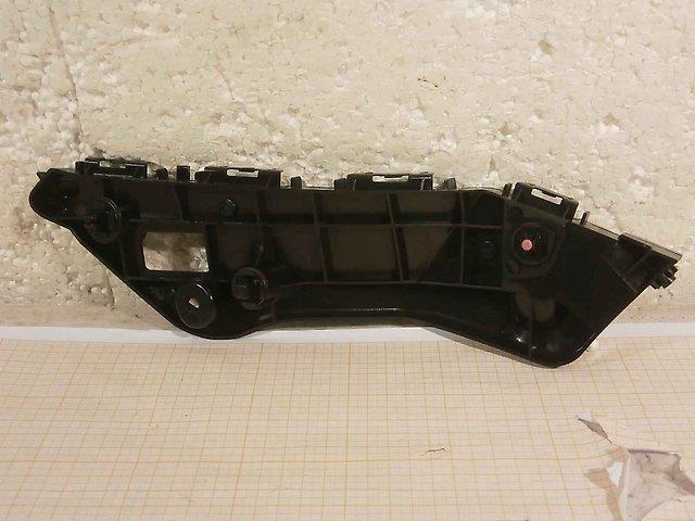 5253542070 Toyota Consola externa direita do pára-choque dianteiro