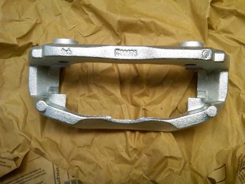 2E0609139B VAG Braçadeira do freio de suporte dianteiro