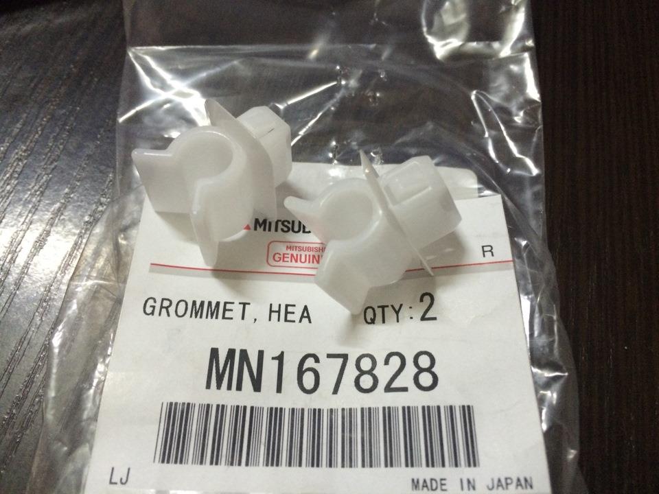 MN167828 Mitsubishi Braçadeira de fixação das luzes