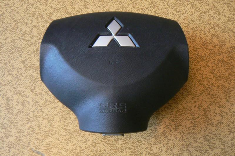 7030A105XA Mitsubishi Cinto de segurança (AIRBAG) de condutor
