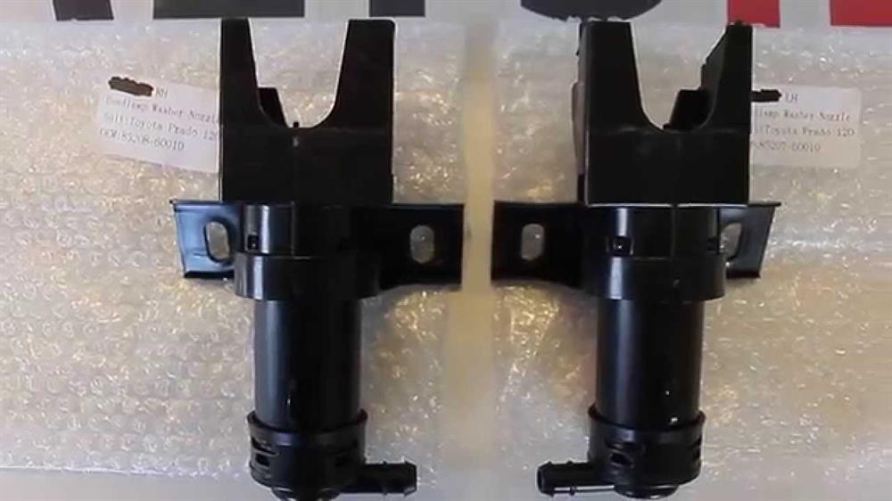 8520760010 Toyota Suporte do injetor de fluido para lavador das luzes (cilindro de elevação)
