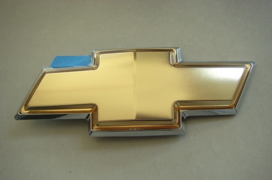 96985011 General Motors Emblema de tampa de porta-malas (emblema de firma)