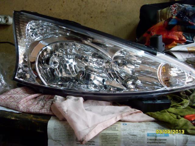 8301A545 Mitsubishi Luz esquerda