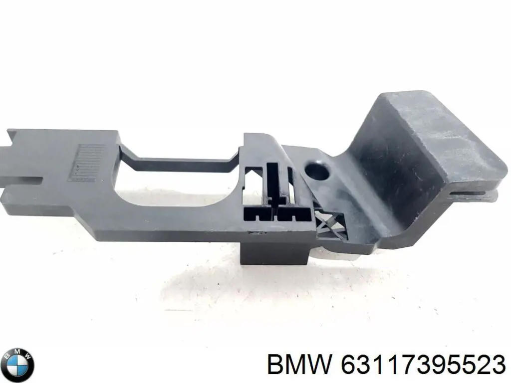 63117395523 BMW Consola (adaptador) de fixação da luz dianteira esquerda