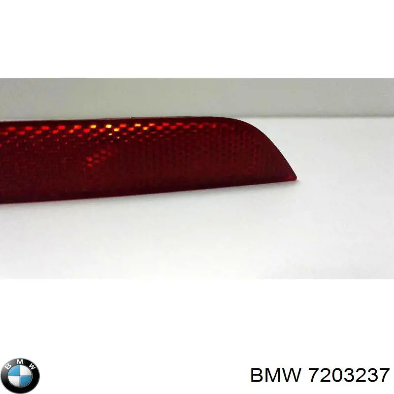 7203237 BMW Retrorrefletor (refletor) do pára-choque traseiro esquerdo
