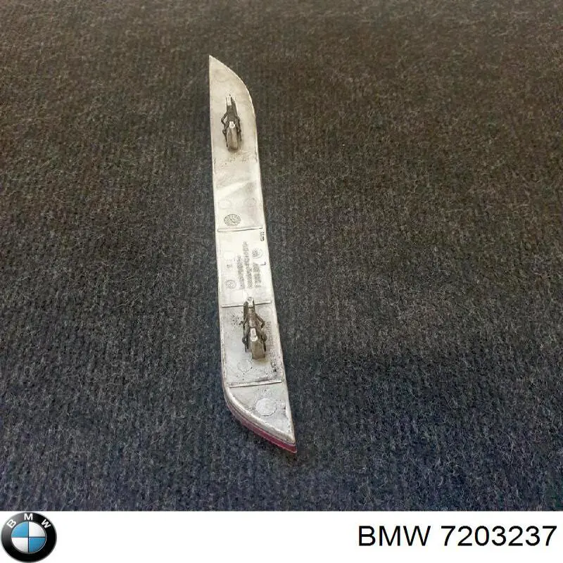 7203237 BMW Retrorrefletor (refletor) do pára-choque traseiro esquerdo