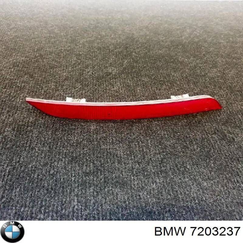 Retrorrefletor (refletor) do pára-choque traseiro esquerdo 7203237 BMW