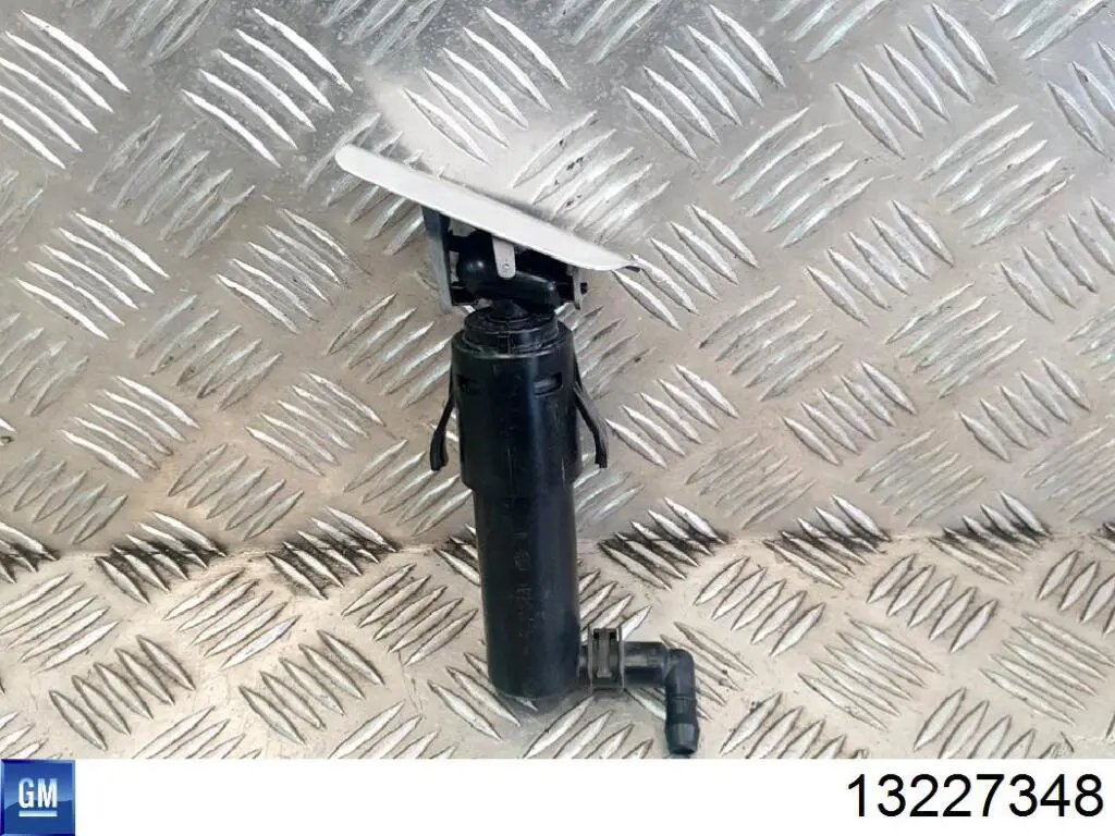 Suporte do injetor de fluido para lavador das luzes (cilindro de elevação) 1452125 General Motors