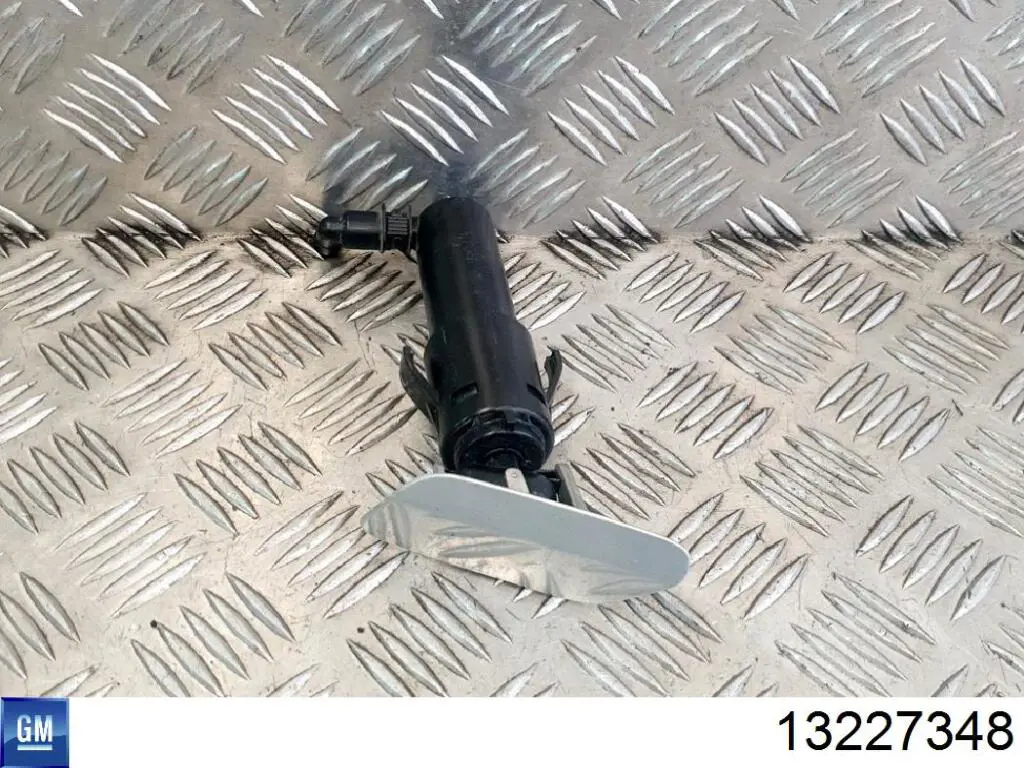 Compre 1452125 General Motors Suporte do injetor de fluido para lavador das luzes (cilindro de elevação)