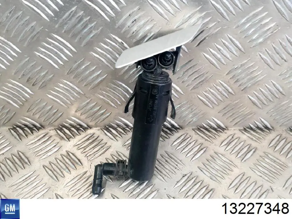 Suporte do injetor de fluido para lavador das luzes (cilindro de elevação) 1452125 General Motors