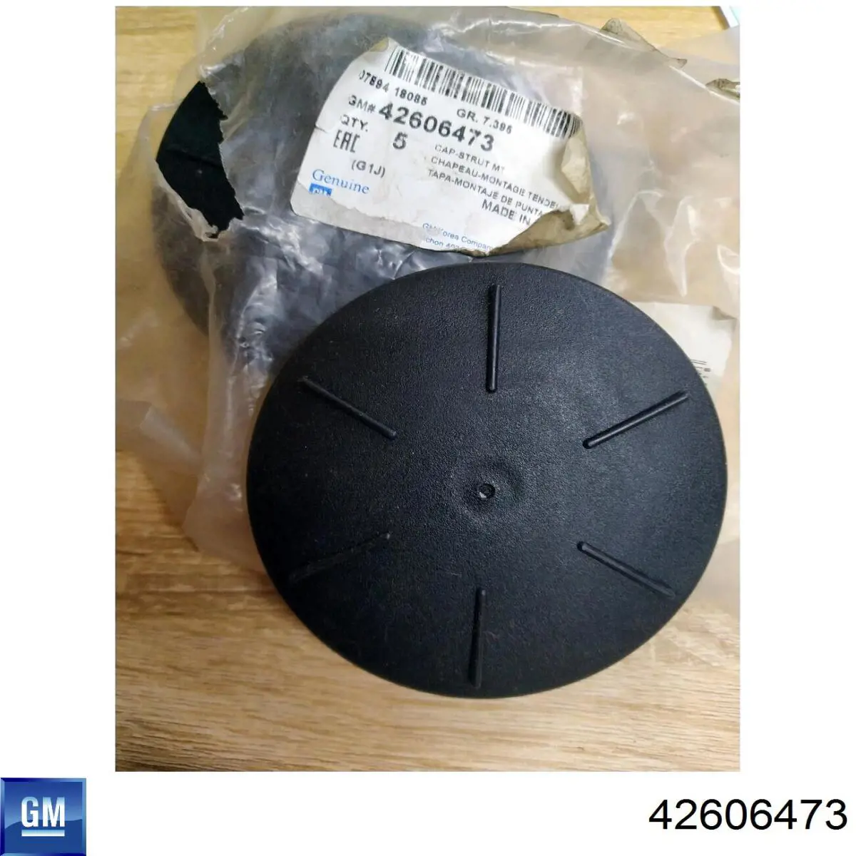 42606473 General Motors Tampa de suporte do amortecedor dianteiro
