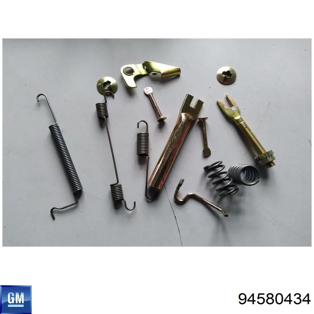 94580434 General Motors Mola das sapatas do freio de tambor traseiras