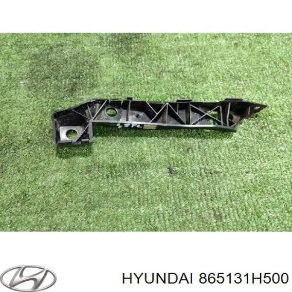 865131H500 Hyundai/Kia Consola externa esquerda do pára-choque dianteiro