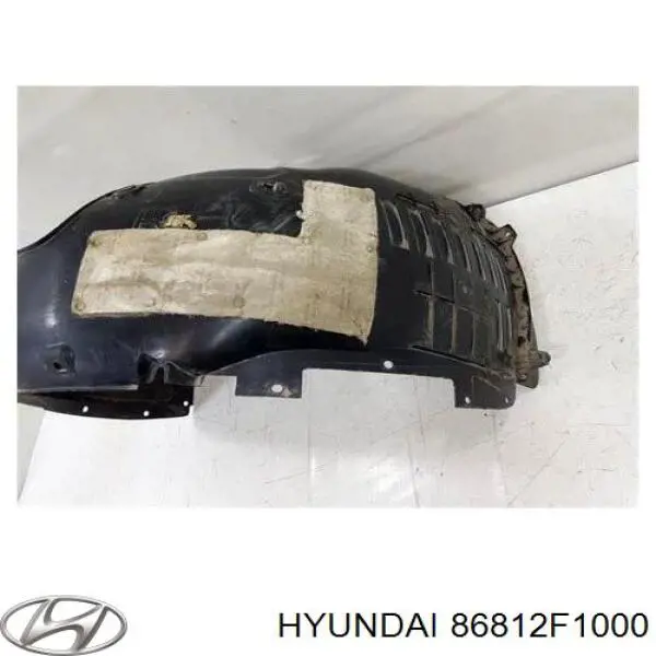 86812F1000 Hyundai/Kia Guarda-barras direito do pára-lama dianteiro