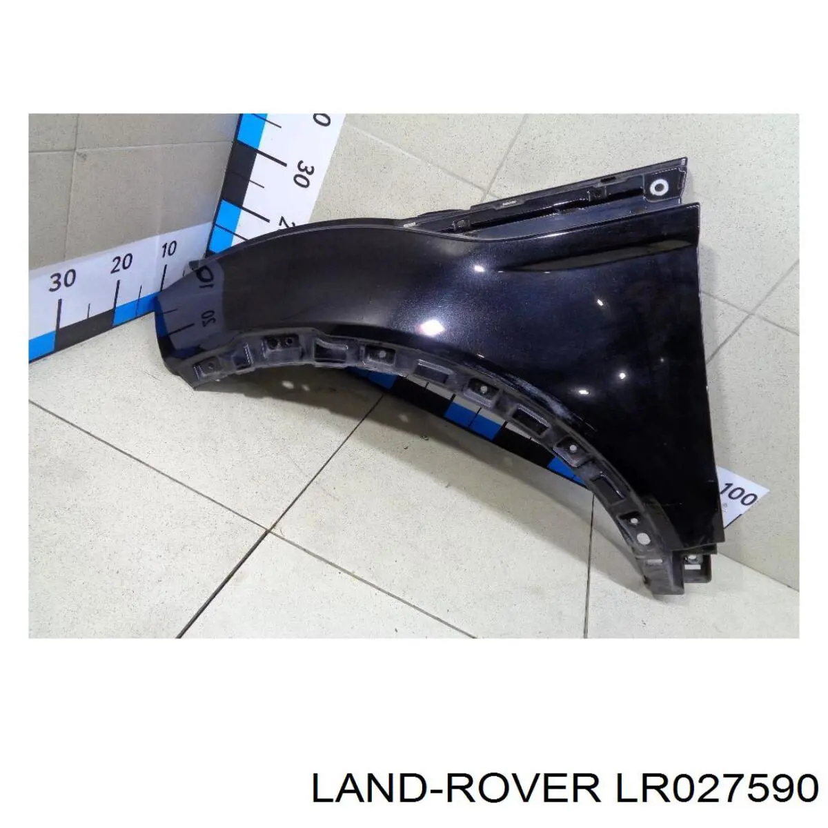 Pára-lama dianteiro esquerdo LR027590 Land Rover