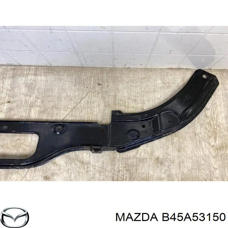 Suporte superior do radiador (painel de montagem de fixação das luzes) Mazda B45A53150 preço, a partir de 46,60 USD