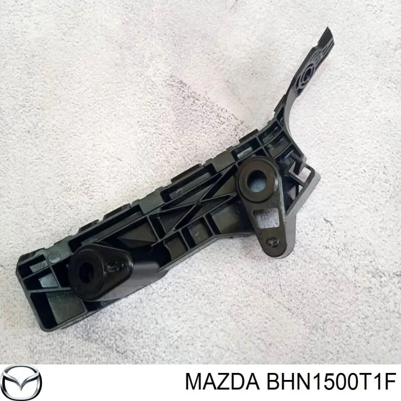 BHN1500T1F Mazda Consola do pára-choque dianteiro direito