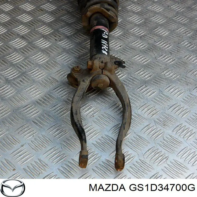 GS1D34700G Mazda Amortecedor dianteiro direito