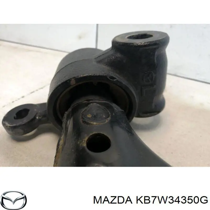 Compre KB7W34350C Mazda Braço oscilante inferior esquerdo de suspensão dianteira