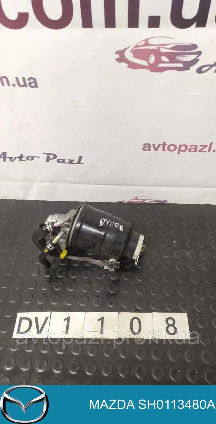 SH0113480A Mazda Caixa de filtro de combustível