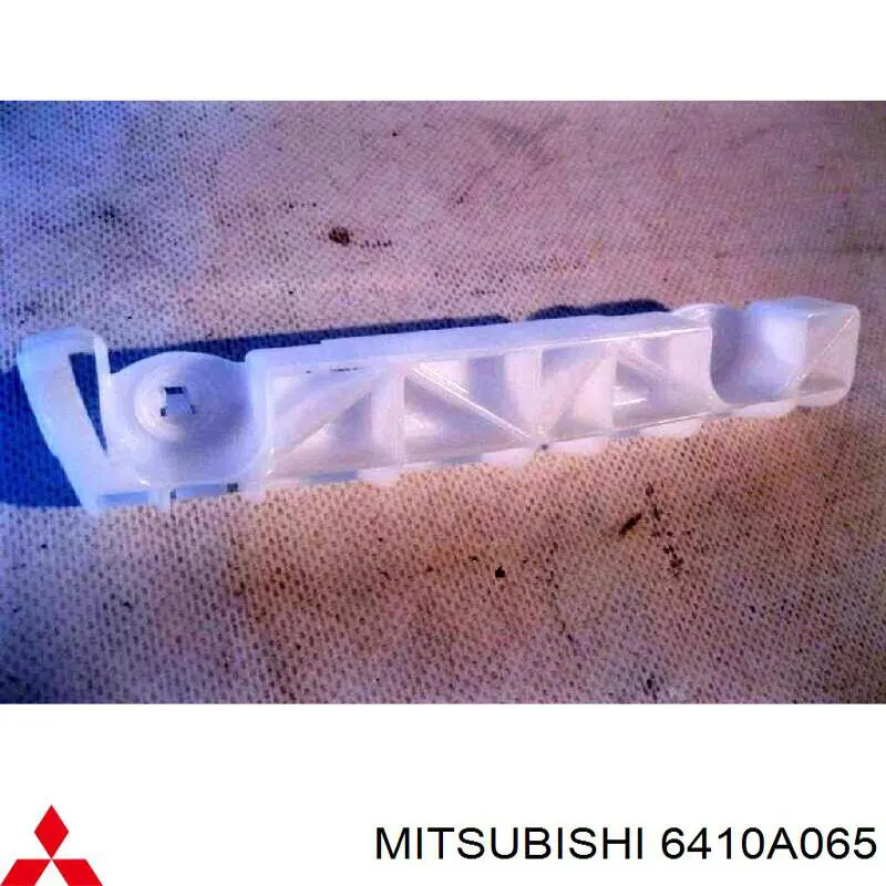 6410A065 Mitsubishi Guia esquerda do pára-choque traseiro
