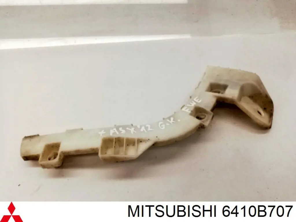 6410B707 Mitsubishi Consola esquerda do pára-choque traseiro