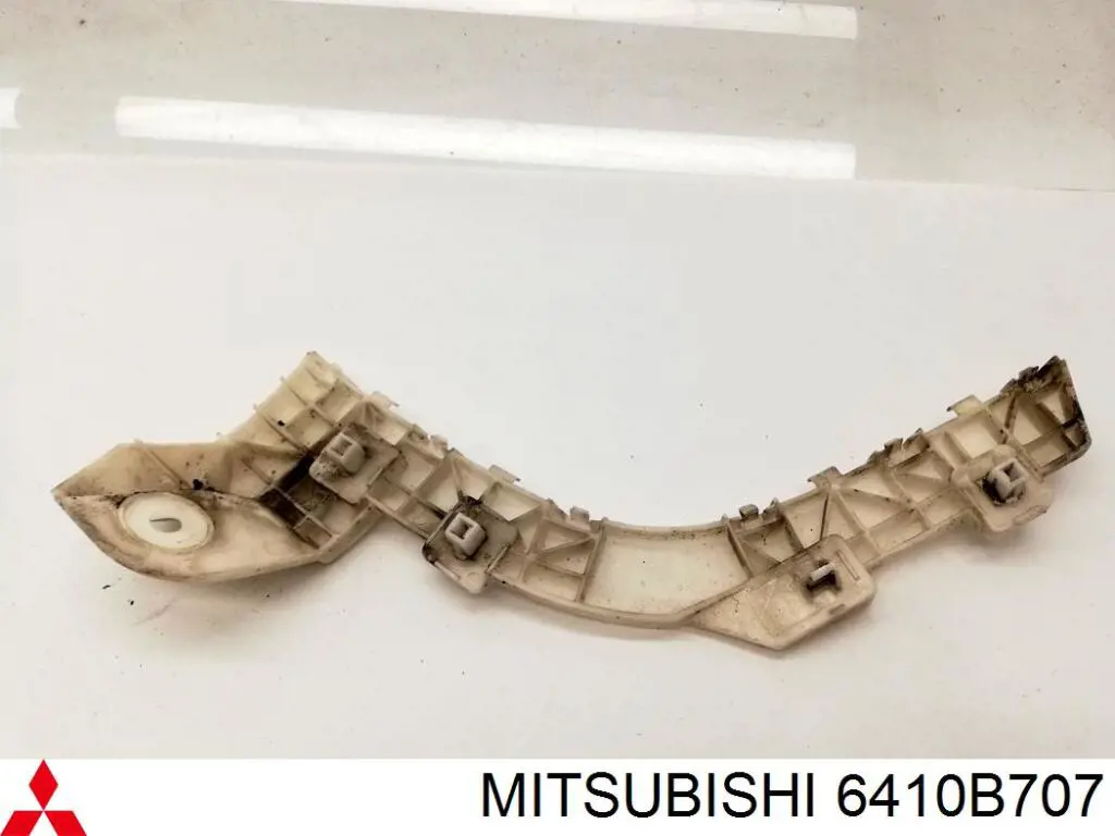 Consola esquerda do pára-choque traseiro Mitsubishi 6410B707 preço, a partir de 21,73 USD