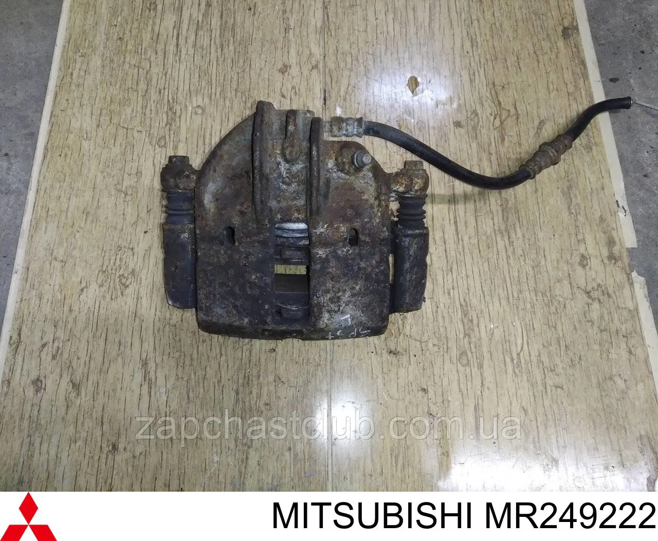 MR249222 Mitsubishi Suporte do freio dianteiro esquerdo