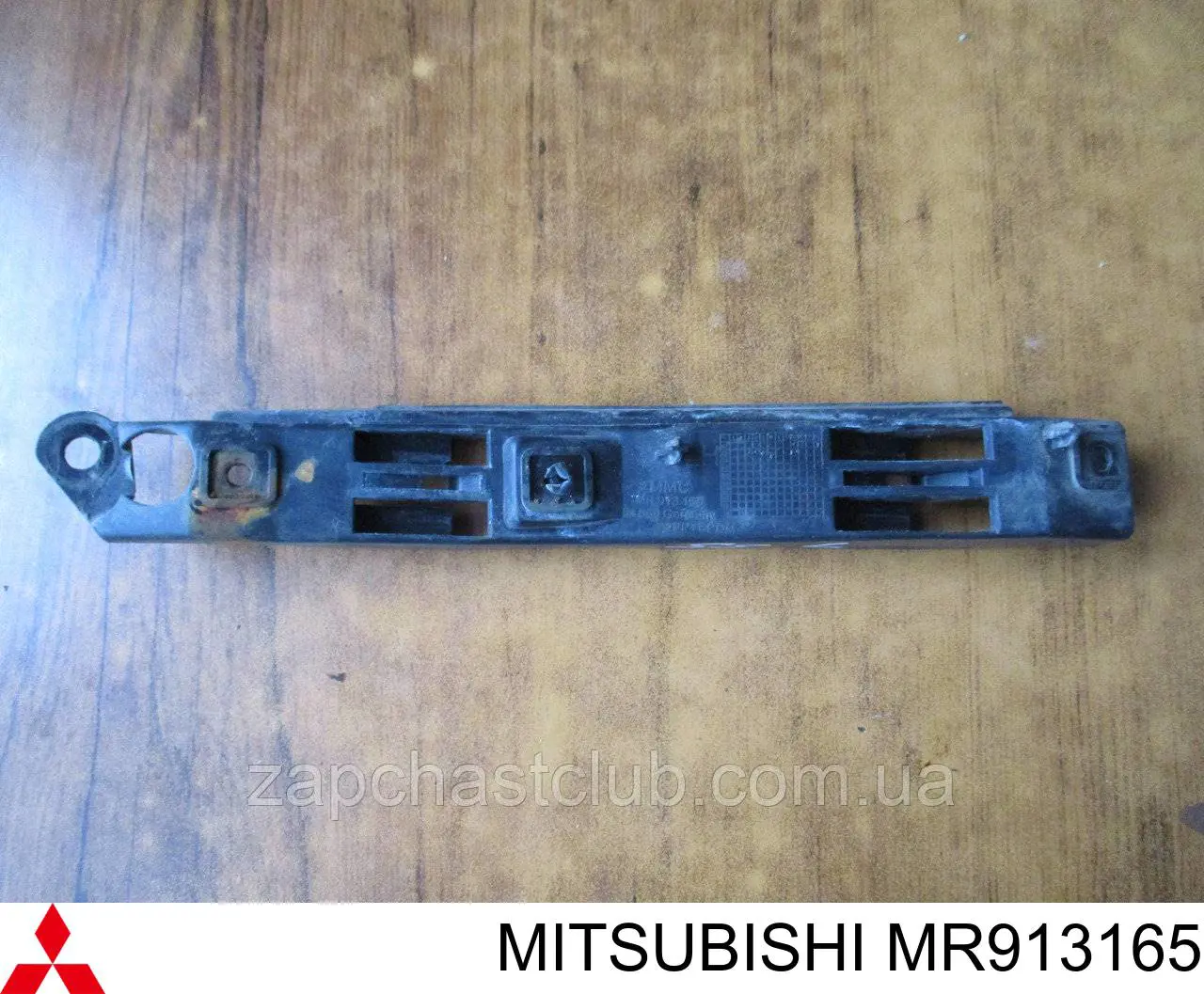 MR913165 Mitsubishi Consola do pára-choque dianteiro esquerdo