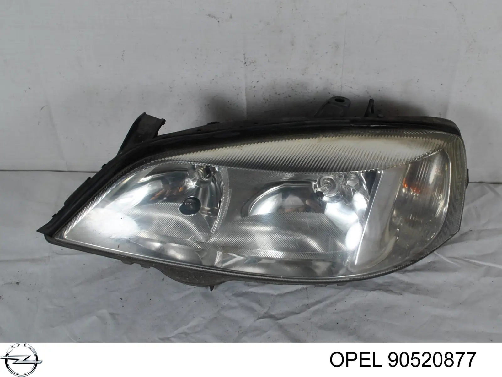 90520877 Opel Luz esquerda