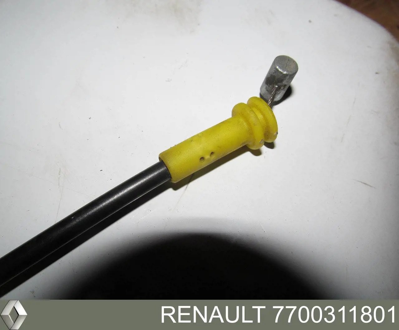 7700311801 Renault (RVI) Cabo (pedal) de abertura do fecho da porta dianteira