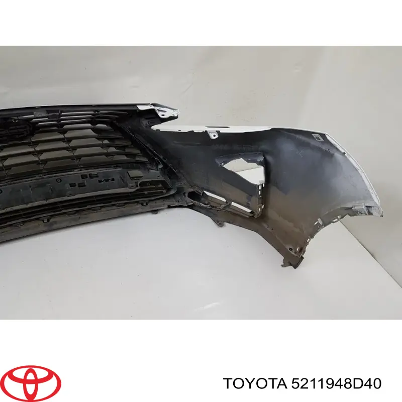 Pára-choque dianteiro 5211948D40 Toyota