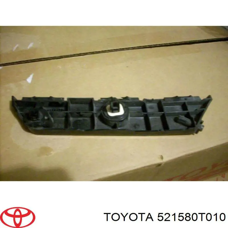 521580T010 Toyota Consola esquerda do pára-choque traseiro externo