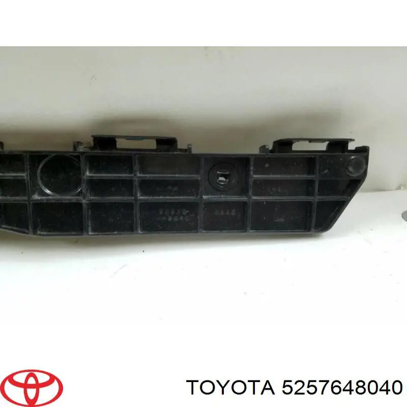 5257648040 Toyota Consola esquerda do pára-choque traseiro externo