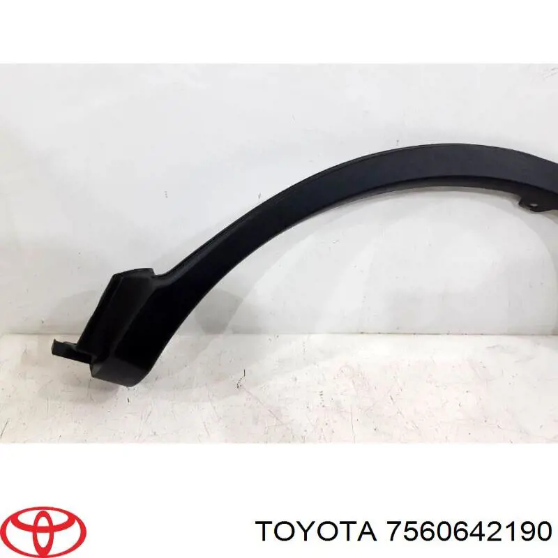 7560642190 Toyota Expansor esquerdo (placa sobreposta) de arco do pára-lama traseiro