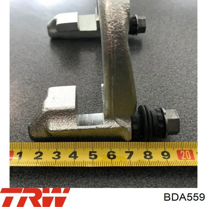 Braçadeira do freio de suporte traseiro TRW BDA559 preço, a partir de 38,01 USD
