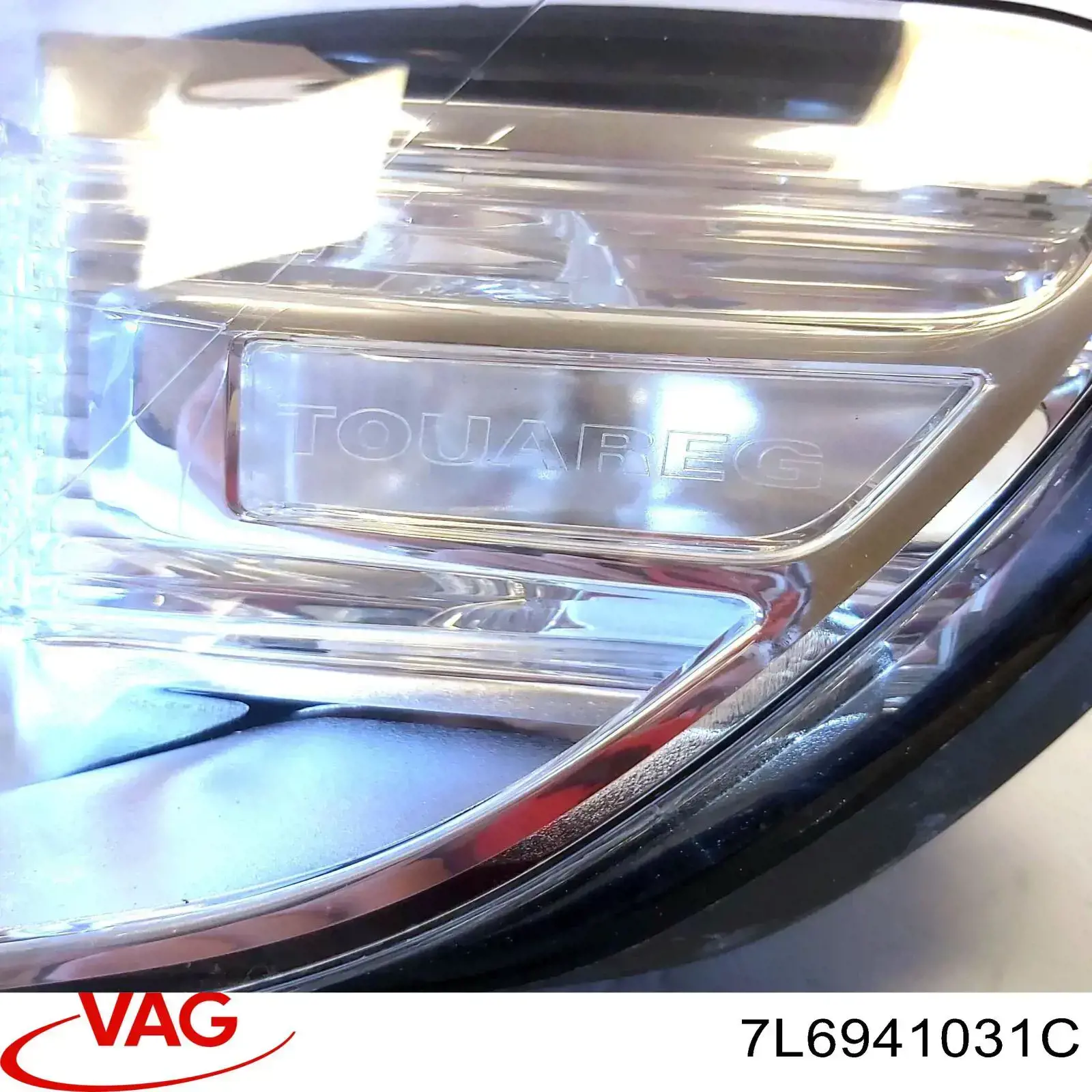 7L6941031C VAG Luz esquerda