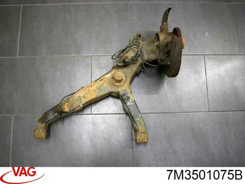 7M3501075B VAG Braço oscilante inferior esquerdo de suspensão traseira