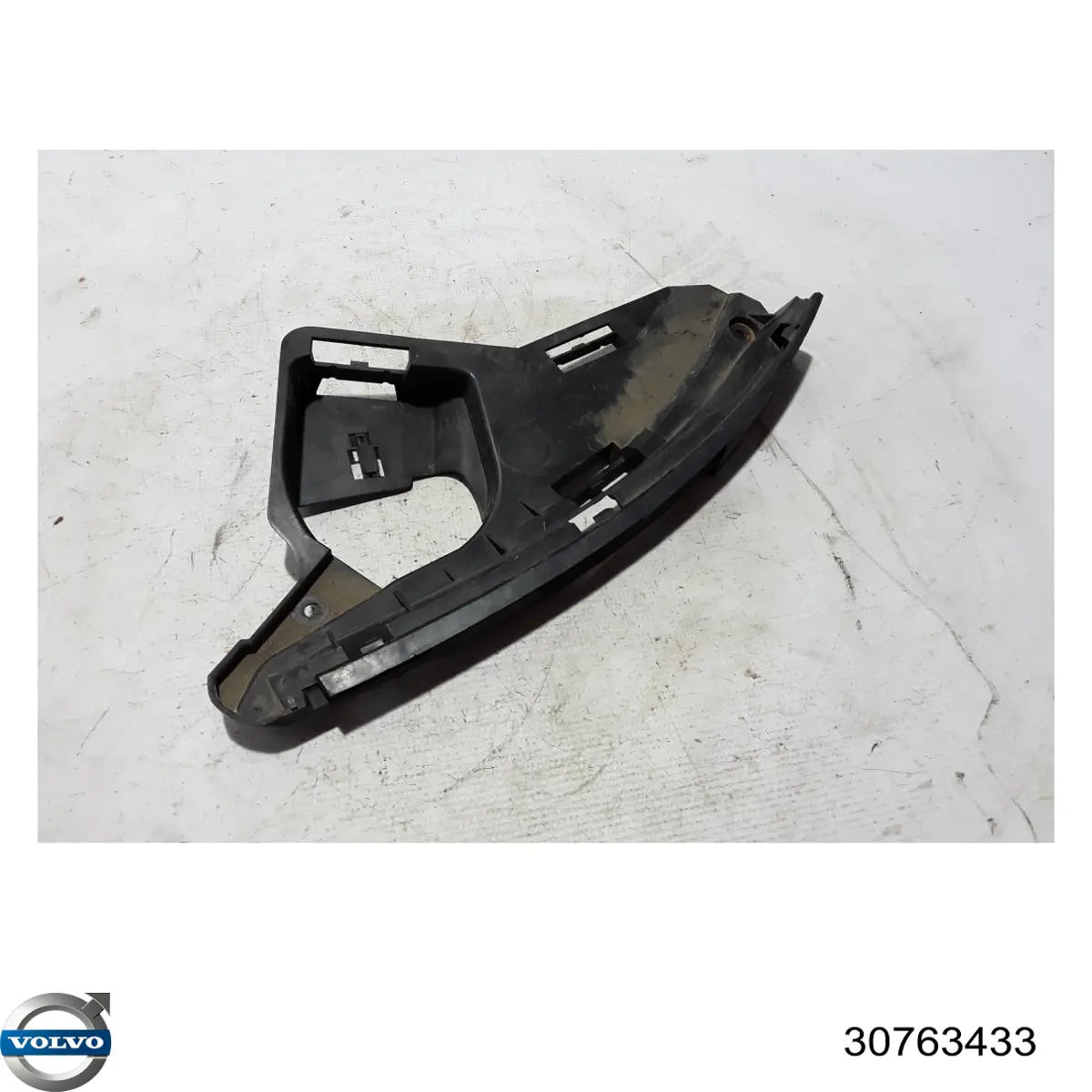 Consola (adaptador) de fixação da luz dianteira esquerda 30763433 Volvo