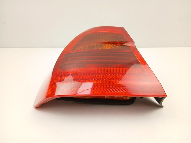 Lanterna traseira esquerda externa 6937457 BMW