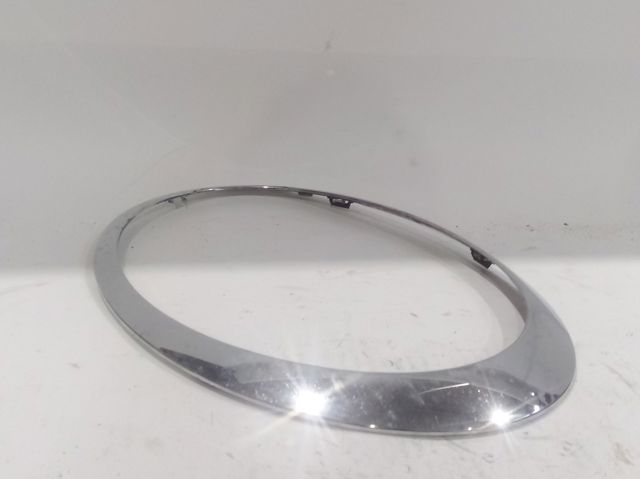 Carcaça (cobrimento) da luz esquerda 7149905 BMW