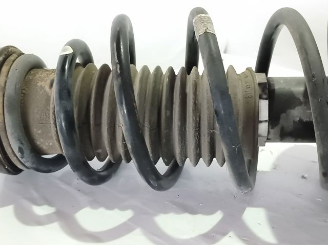 Amortecedor dianteiro esquerdo 13412611 OPEL
