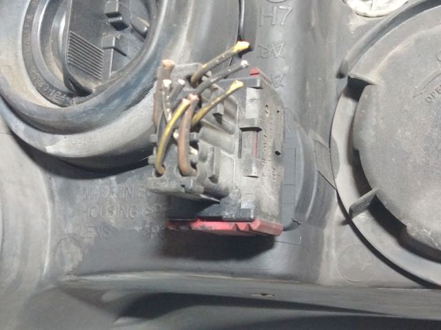 Luz esquerda 13115006 OPEL