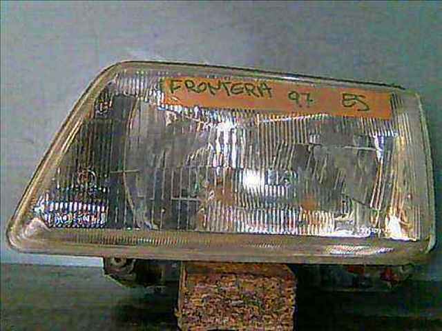 Luz esquerda 1216001 OPEL