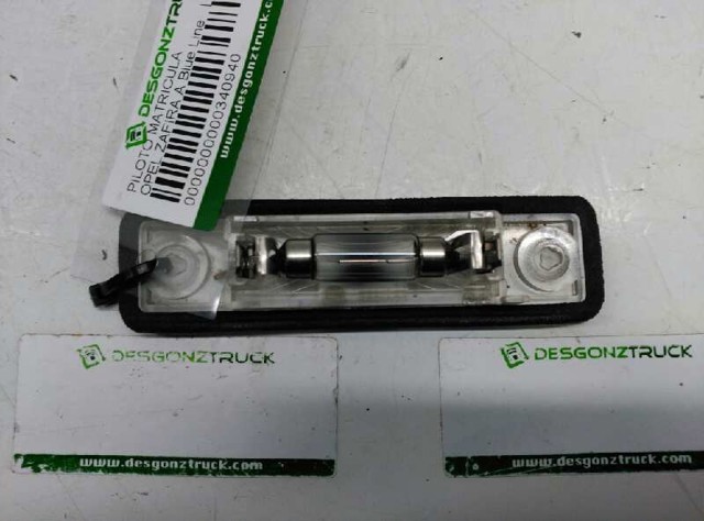 Lanterna da luz de fundo de matrícula traseira 1224143 OPEL