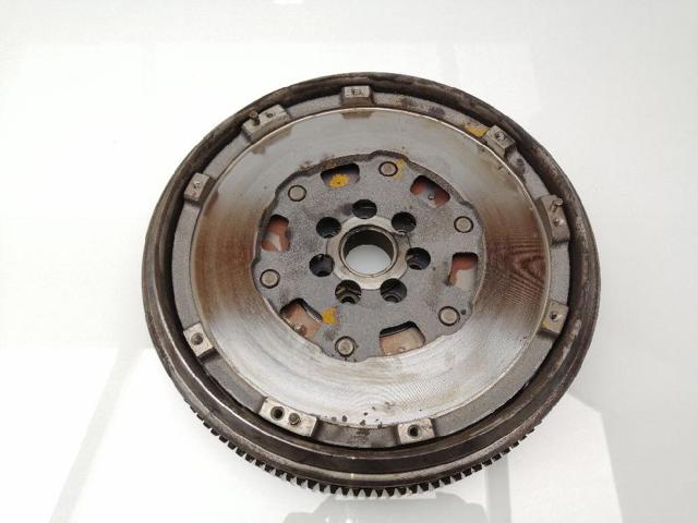 Volante de motor 1231000Q0J NISSAN