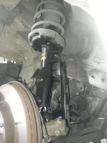 Amortecedor dianteiro esquerdo 13390290 OPEL